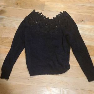 Gorgeous black sweater with applique detail